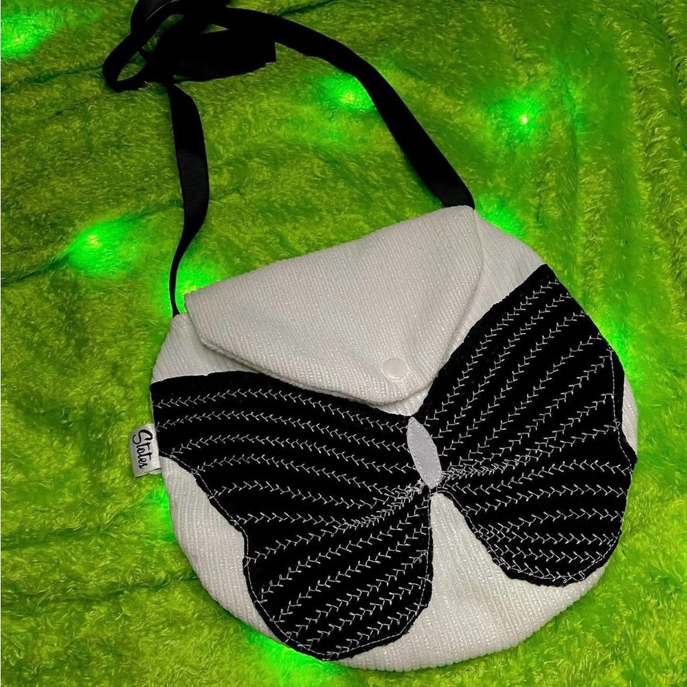 Stotes White Crossbody Bag with Black Butterfly Applique